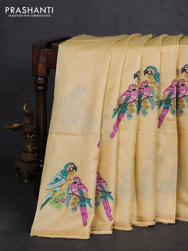 Pure tussar silk saree pale yellow with parrot embroidery work and small zari woven border