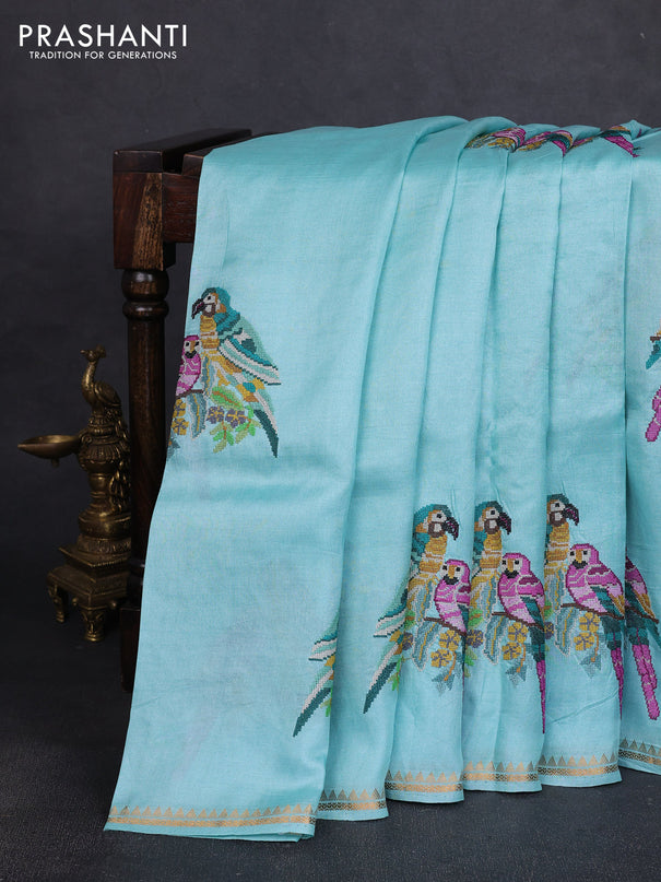Pure tussar silk saree teal blue with parrot embroidery work and small zari woven border