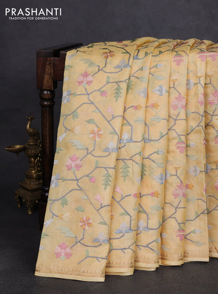 Pure tussar silk saree yellow with allover embroidery work and small zari woven border