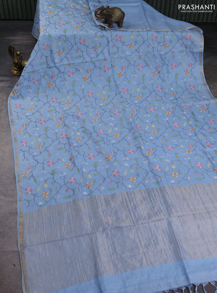 Pure tussar silk saree light blue with allover embroidery work and small zari woven border