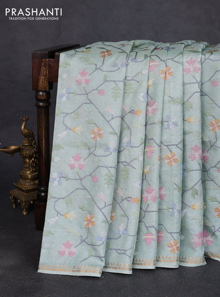 Pure tussar silk saree pastel green with allover embroidery work and small zari woven border