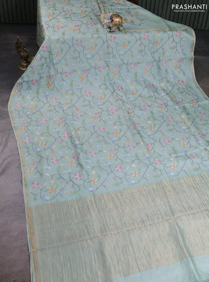 Pure tussar silk saree pastel green with allover embroidery work and small zari woven border