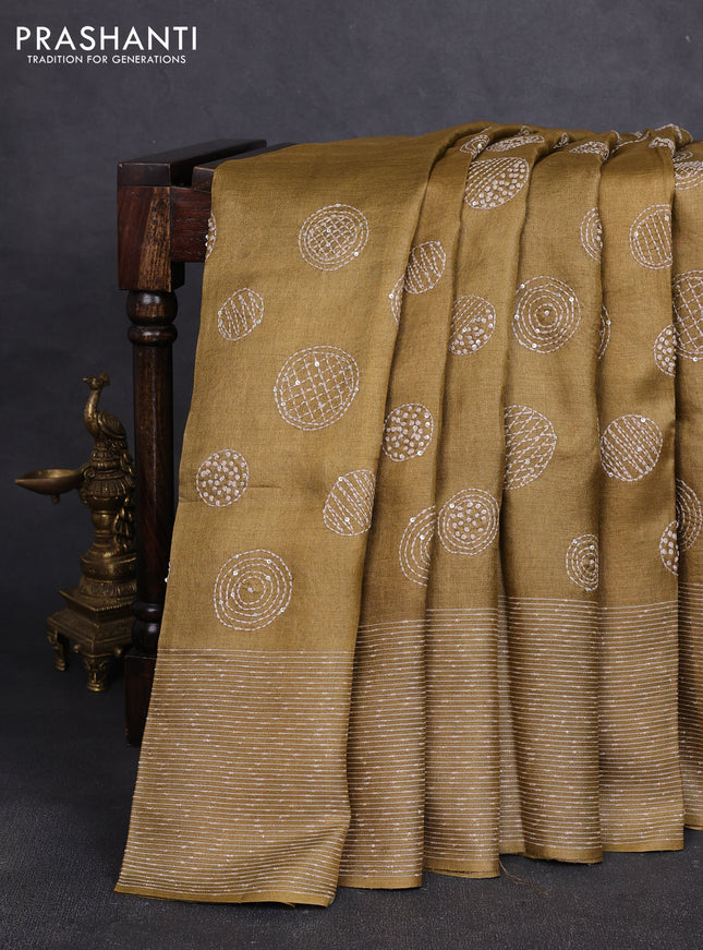 Pure tussar silk saree dark sandal with embroidered buttas and thread woven border