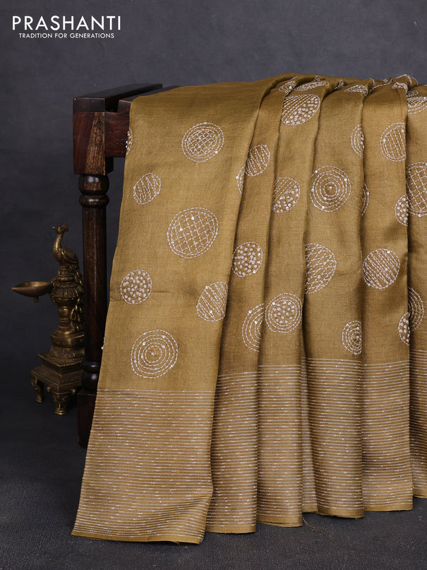 Pure tussar silk saree dark sandal with embroidered buttas and thread woven border