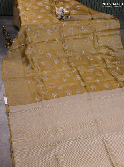 Pure tussar silk saree dark sandal with embroidered buttas and thread woven border