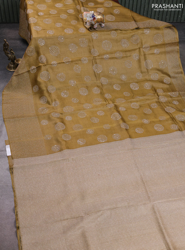 Pure tussar silk saree dark sandal with embroidered buttas and thread woven border