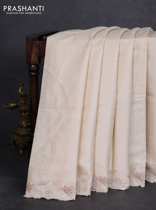 Pure tussar silk saree cream with plain body and floral embroidery border