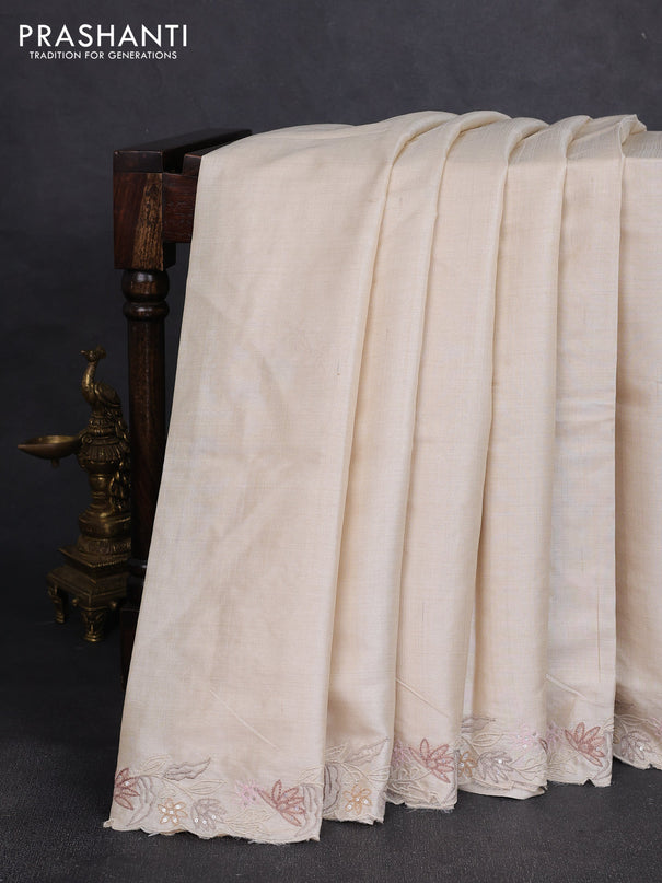 Pure tussar silk saree cream with plain body and floral embroidery border