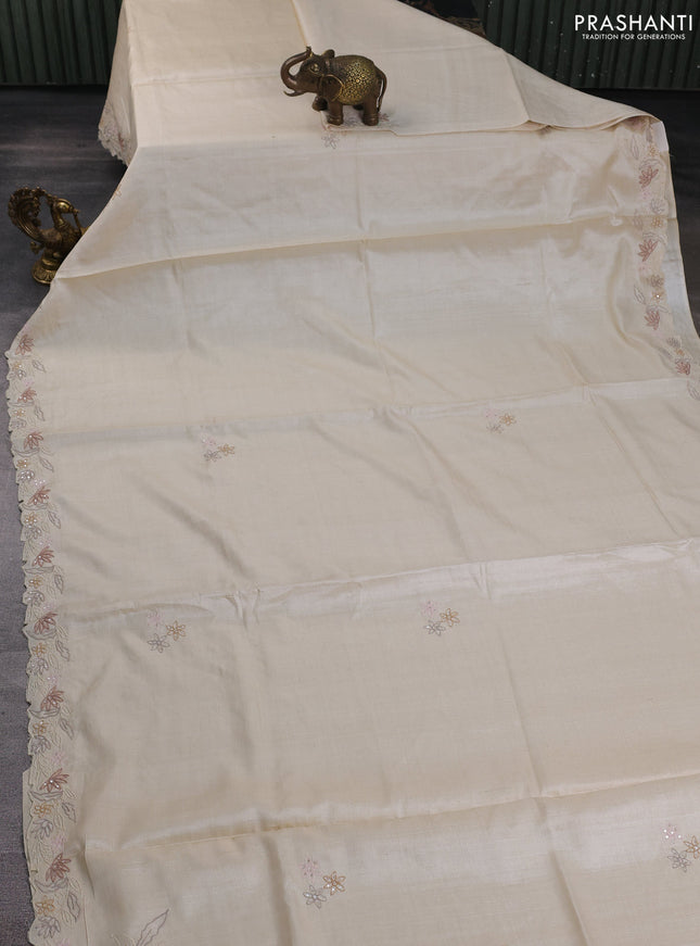 Pure tussar silk saree cream with plain body and floral embroidery border
