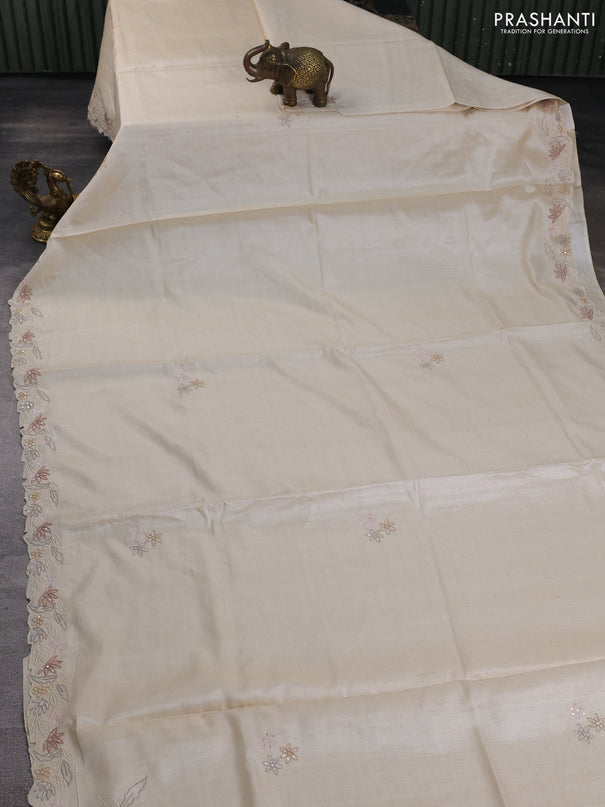 Pure tussar silk saree cream with plain body and floral embroidery border