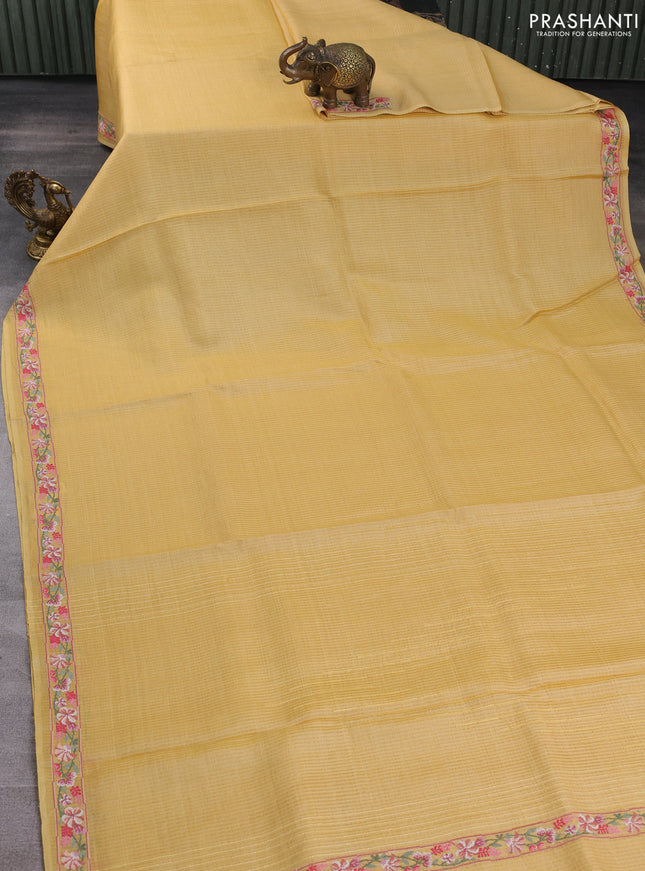 Pure tussar silk saree yellow shade with plain body and embroidery border