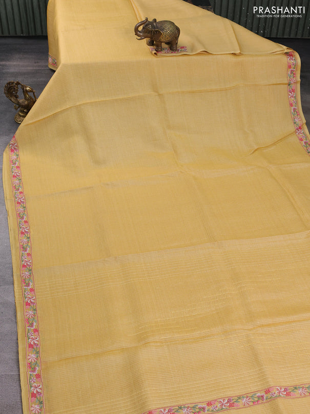 Pure tussar silk saree yellow shade with plain body and embroidery border