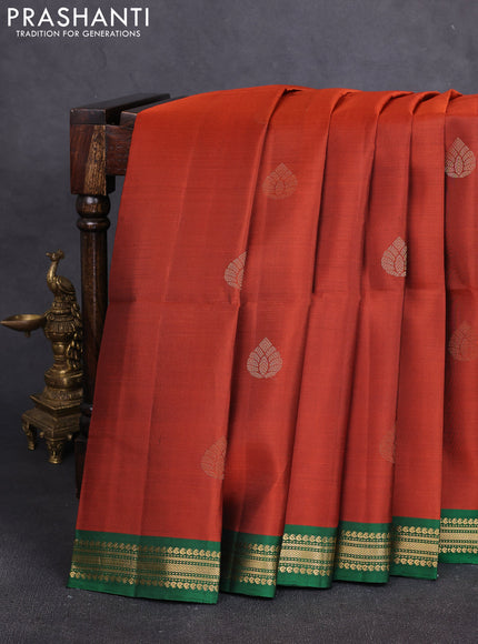 Pure soft silk saree rust shade and green with zari woven buttas and small zari woven border