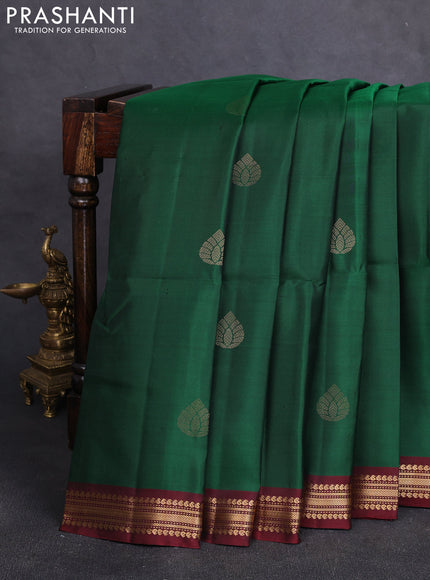 Pure soft silk saree bottle green and deep maroon with zari woven buttas and small zari woven border