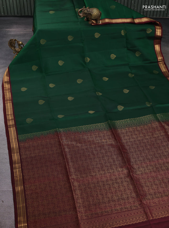 Pure soft silk saree bottle green and deep maroon with zari woven buttas and small zari woven border