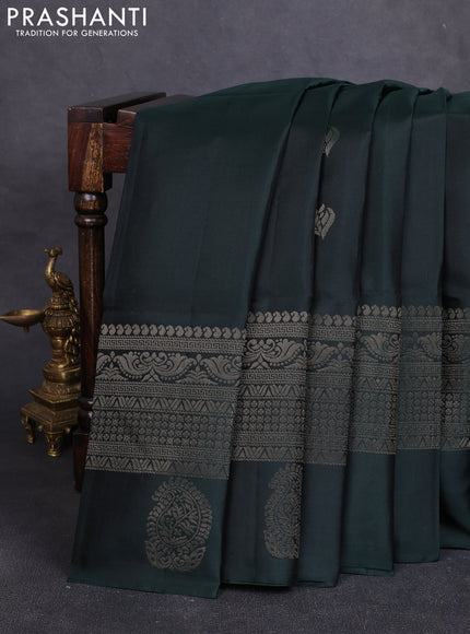 Pure soft silk saree bottle green with allover zari woven buttas and long zari woven butta border