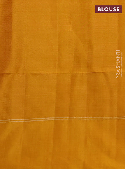Pure soft silk saree navy blue and mustard yellow with allover zari weaves & muniya buttas and zari woven simple border