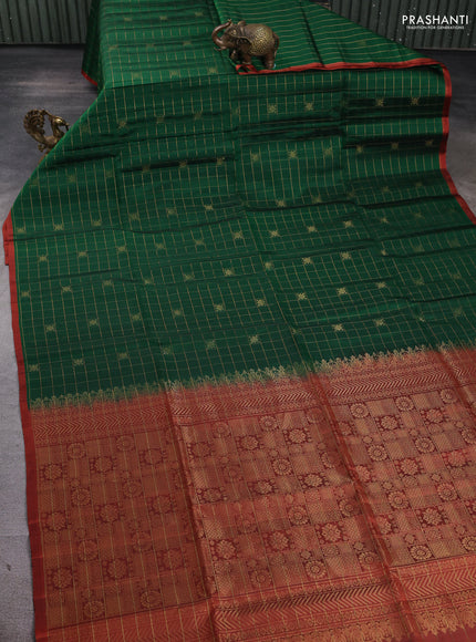 Pure soft silk saree dark green and rust shade with allover zari checks & buttas and piping border