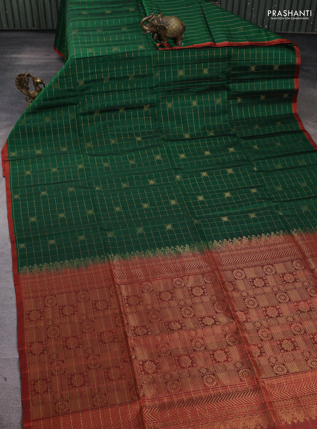 Pure soft silk saree dark green and rust shade with allover zari checks & buttas and piping border