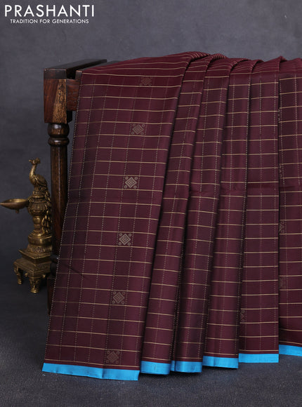 Pure soft silk saree coffee brown and cs blue with allover zari checks & buttas and piping border