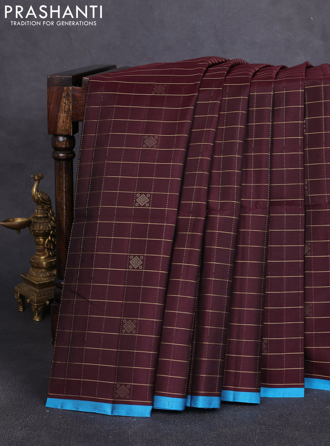 Pure soft silk saree coffee brown and cs blue with allover zari checks & buttas and piping border