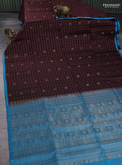 Pure soft silk saree coffee brown and cs blue with allover zari checks & buttas and piping border