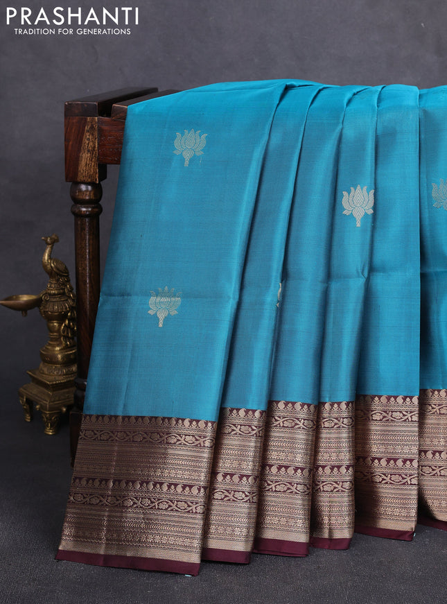Pure soft silk saree peacock blue and wine shade with zari woven floral buttas and zari woven border