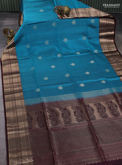 Pure soft silk saree peacock blue and wine shade with zari woven floral buttas and zari woven border