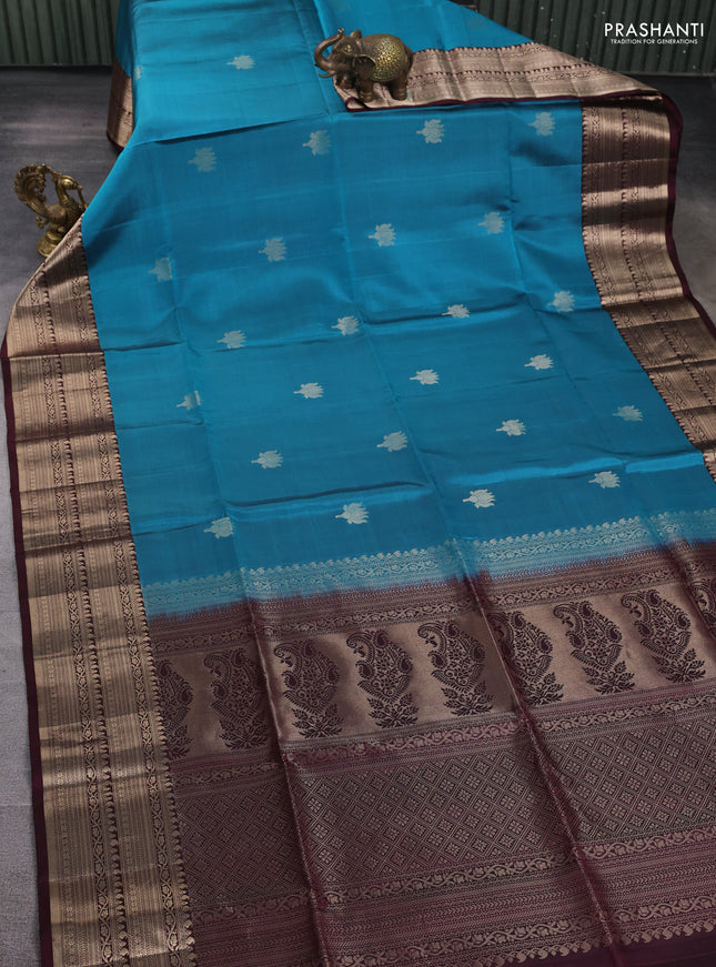 Pure soft silk saree peacock blue and wine shade with zari woven floral buttas and zari woven border