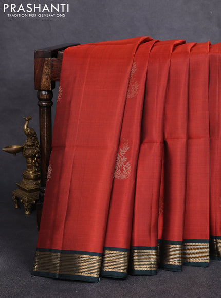 Pure soft silk saree rustic orange and peacock green with zari woven buttas and zari woven border