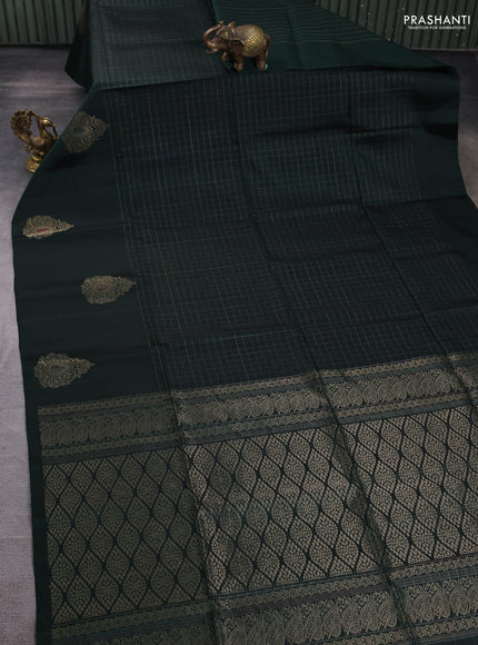 Pure soft silk saree bottle green with allover zari checked pattern and long zari woven butta border