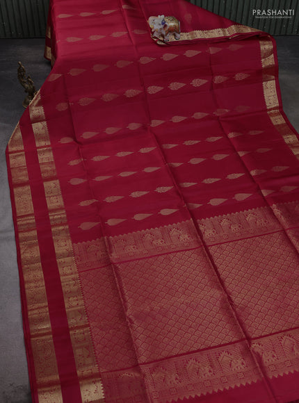 Pure soft silk saree maroon with allover zari woven buttas and rettapet zari woven border