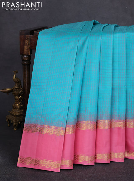 Pure soft silk saree teal blue and peach with allover checked pattern and rettapet zari woven border