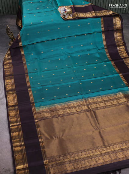 Pure soft silk saree teal green and coffee brown with zari woven buttas and rettapet zari woven border