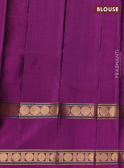 Pure soft silk saree dark green and purple with zari woven buttas and rettapet zari woven border