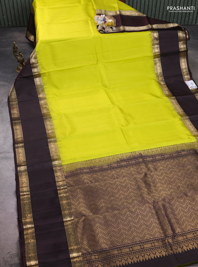 Pure soft silk saree lime yellow and coffee brown with allover zari stripe pattern and long rettapet zari woven border