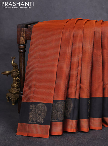 Pure soft silk saree rust shade and black with allover zari stripe pattern and zari woven annam butta border