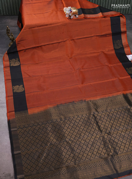 Pure soft silk saree rust shade and black with allover zari stripe pattern and zari woven annam butta border