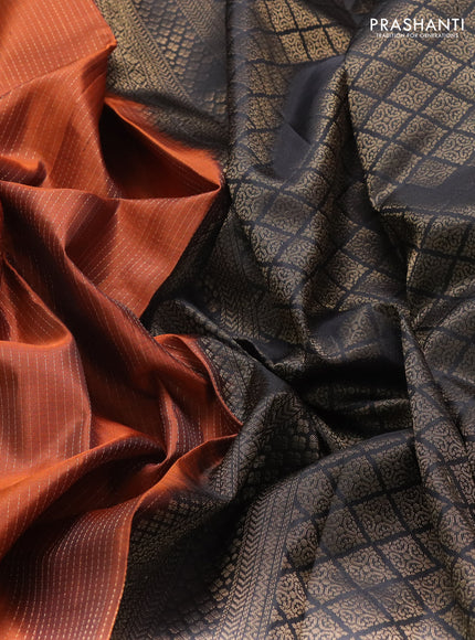Pure soft silk saree rust shade and black with allover zari stripe pattern and zari woven annam butta border