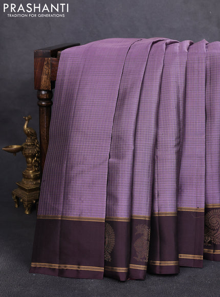 Pure soft silk saree pastel purple and wine shade with allover zari checked pattern and zari woven annam butta border