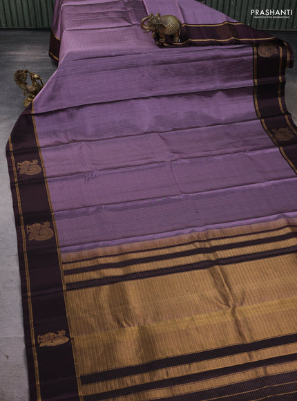 Pure soft silk saree pastel purple and wine shade with allover zari checked pattern and zari woven annam butta border
