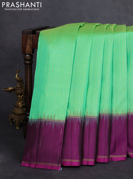 Pure soft silk saree light green and purple with allover silver & gold zari woven butta weaves and rettapet zari woven butta border