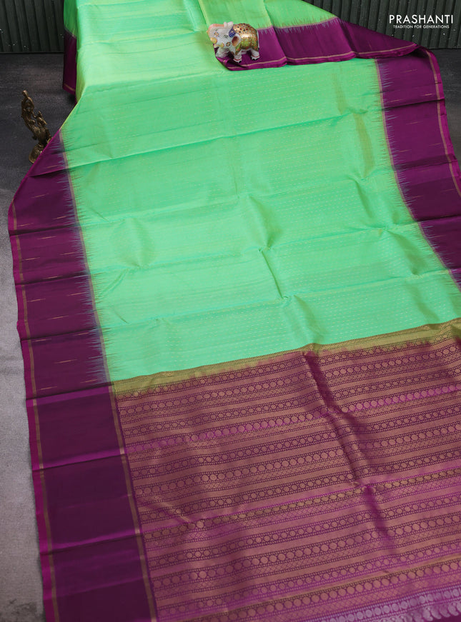 Pure soft silk saree light green and purple with allover silver & gold zari woven butta weaves and rettapet zari woven butta border