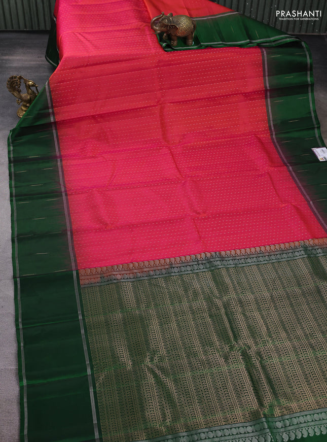 Pure soft silk saree dual shade of pinkish orange and green with allover silver & gold zari woven butta weaves and rettapet zari woven butta border