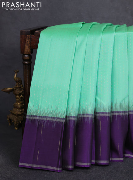 Pure soft silk saree teal green and violet with allover silver & gold zari woven butta weaves and rettapet zari woven butta border