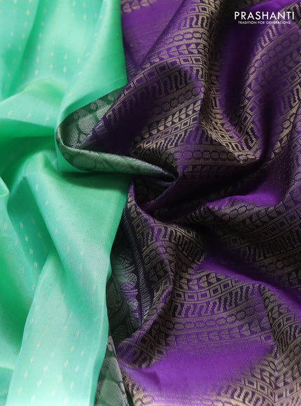 Pure soft silk saree teal green and violet with allover silver & gold zari woven butta weaves and rettapet zari woven butta border