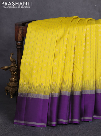 Pure soft silk saree yellow and violet with allover thread weaves & zari buttas and rettapet zari woven border