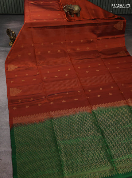 Pure soft silk saree rust shade and green with allover zari weaves & buttas in borderless style