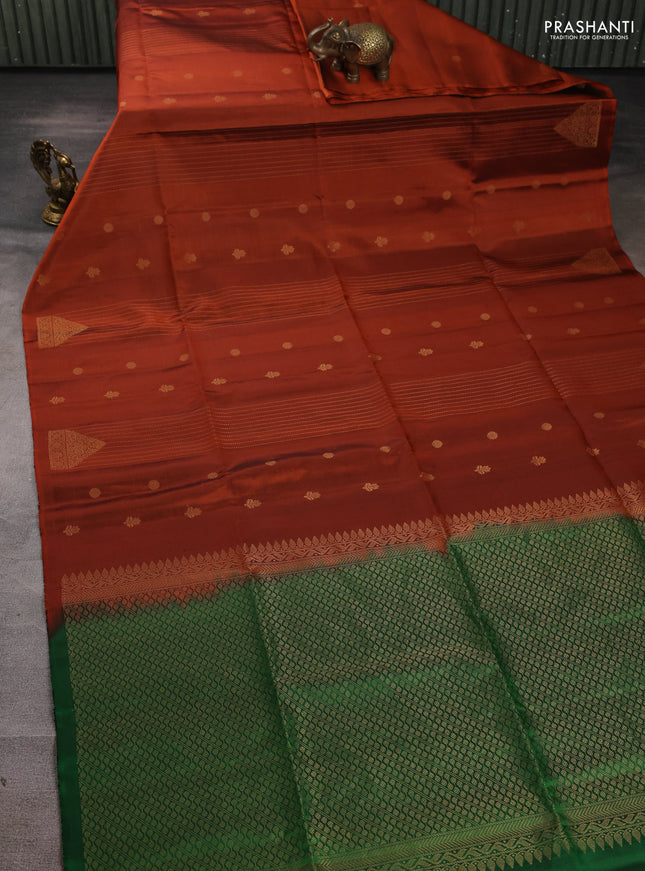 Pure soft silk saree rust shade and green with allover zari weaves & buttas in borderless style