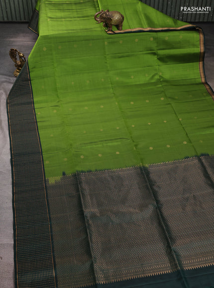 Pure soft silk saree light green and bottle green with zari woven buttas and zari woven checked border
